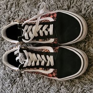 my daughter no longer uses them someone else can...vans black and orange .